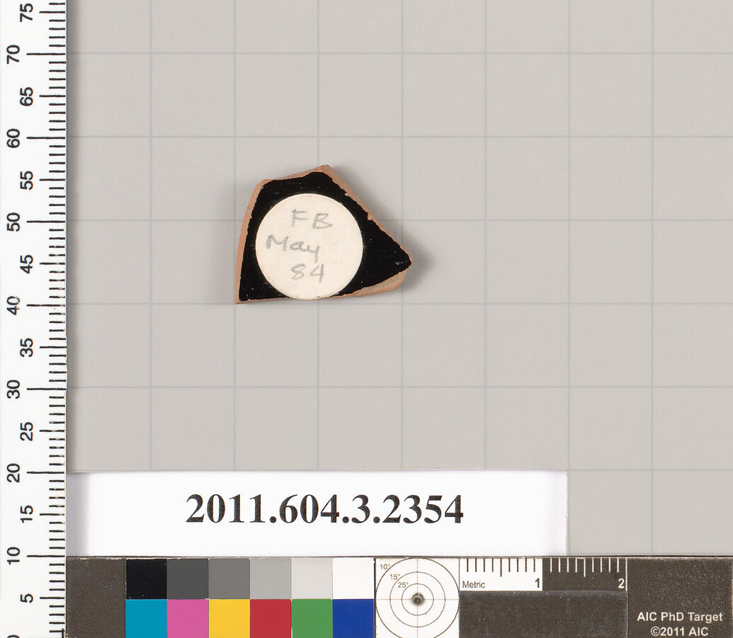 Terracotta fragment of a kylix: eye-cup (drinking cup), Terracotta, Greek, Attic