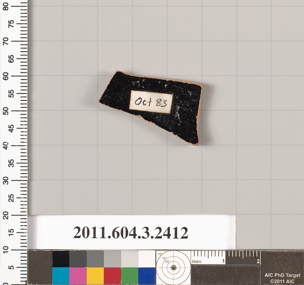 Terracotta fragment of a kylix: eye-cup (drinking cup), Terracotta, Greek, Attic