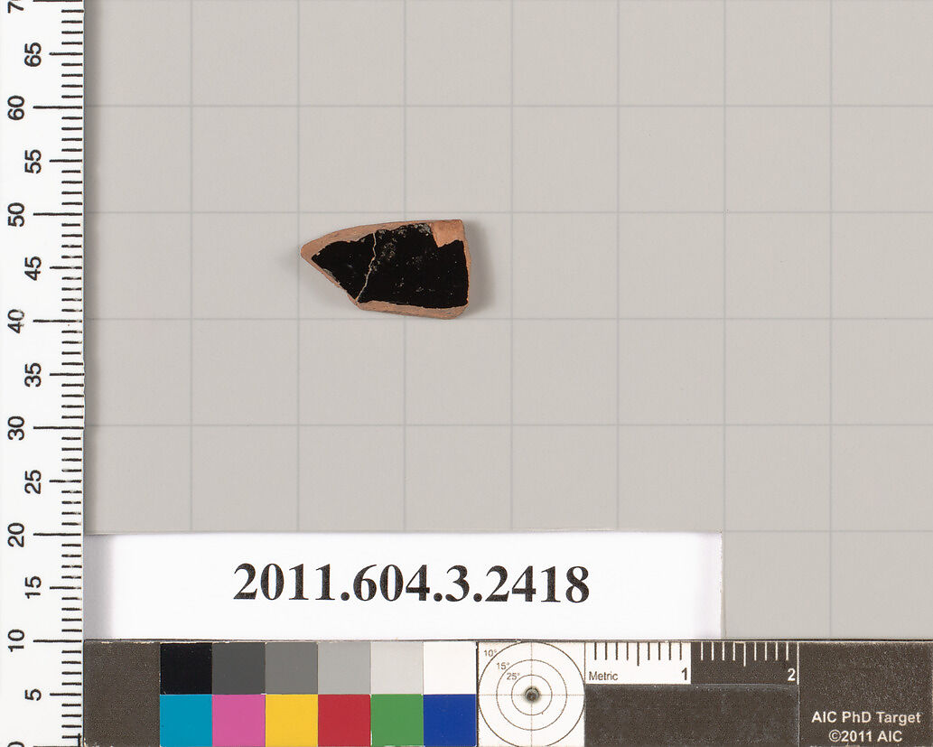 Terracotta fragment of a kylix: eye-cup (drinking cup), Terracotta, Greek, Attic