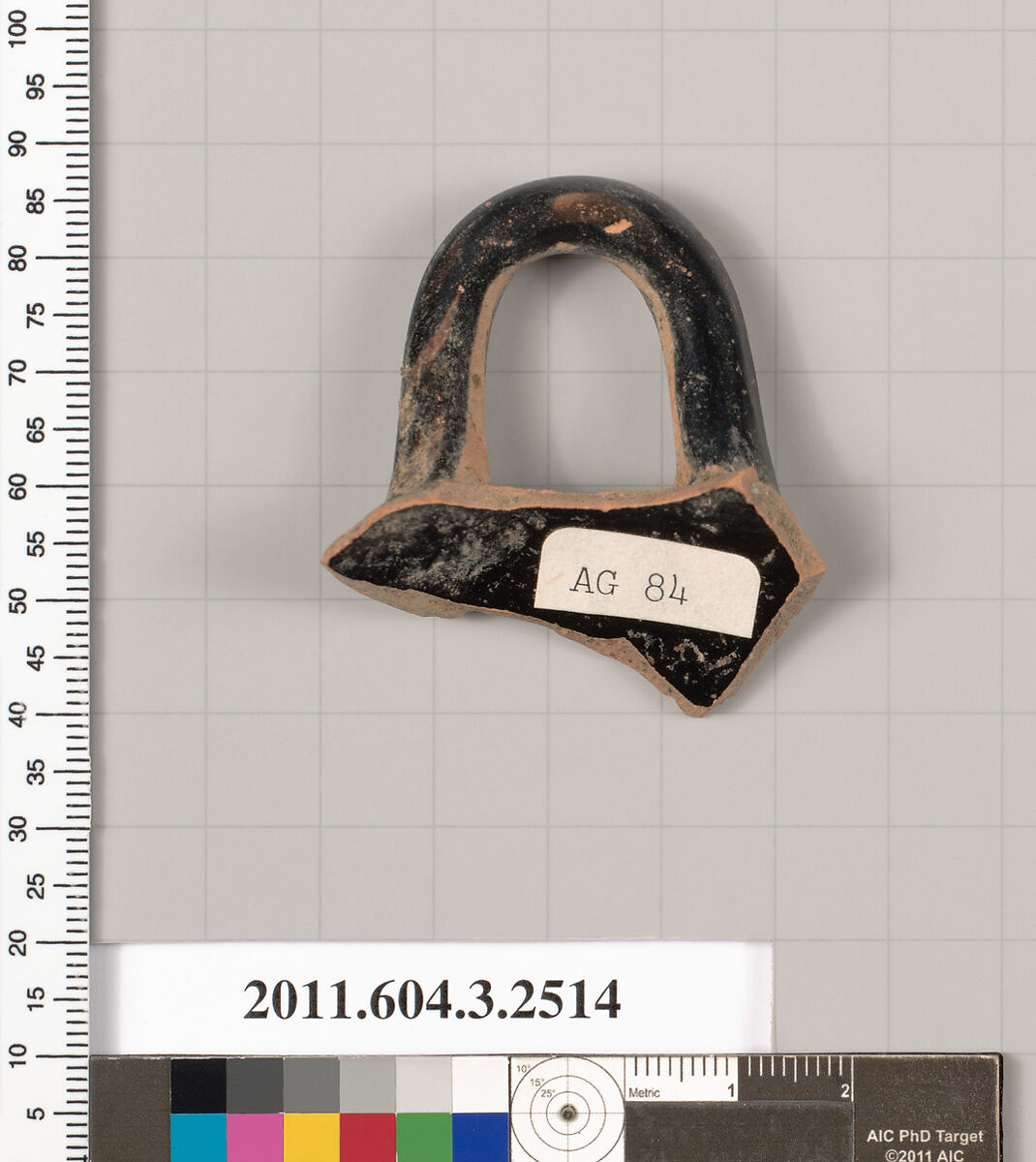 Terracotta fragment of a kylix (drinking cup), Terracotta, Greek, Attic
