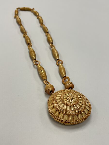 Necklace with disk, Songhay artist, Beeswax, yellow straw, Songhay