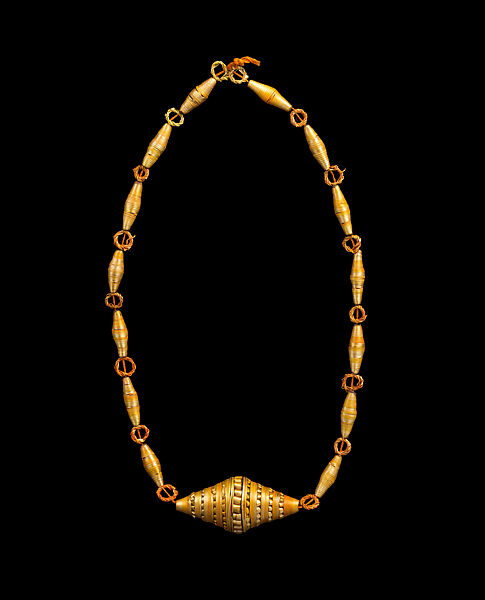 Necklace of 14 oval cylinders, Beeswax and straw, Songhay 