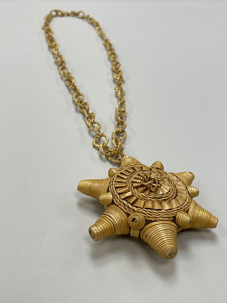 Necklace of plaited rings with large disk and cones, Songhay artist, Straw, beeswax, Songhay