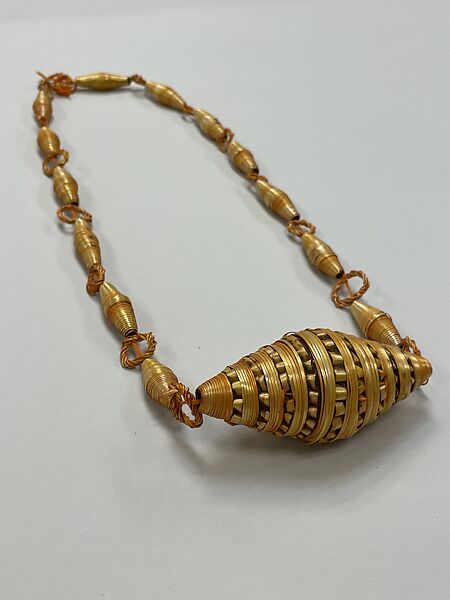 Necklace of 13 cyinders and 14 rings, large cylinder, Songhay artist, Straw and beeswax, Songhay