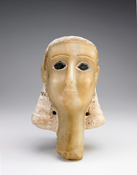 Head of a woman (“Miriam”), Calcite-alabaster, stucco, bitumen, lapis lazuli or glass 