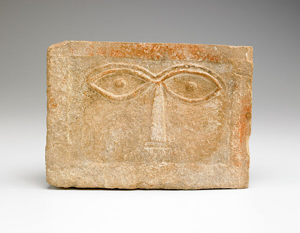 Stele with schematic face, Limestone, pigment 