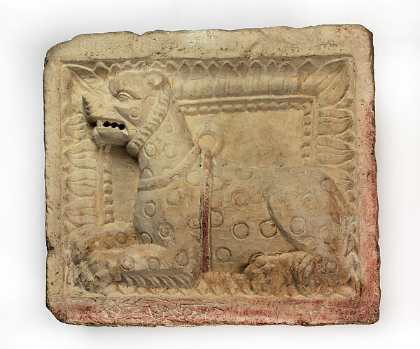 Relief plaque with cheetah, Limestone, pigment