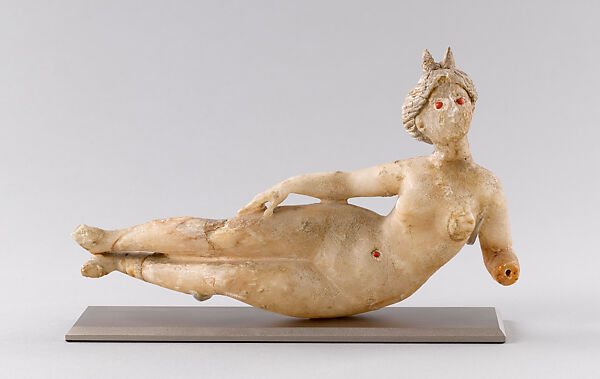 Statuette of reclining nude goddess, Alabaster, glass 