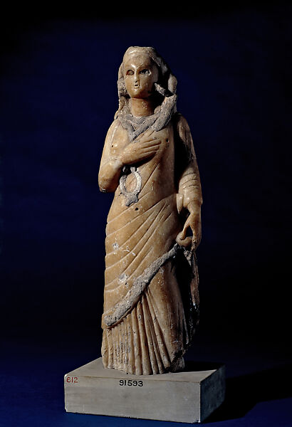 Statuette of standing female figure, Calcite alabaster (?), stucco, pigment 