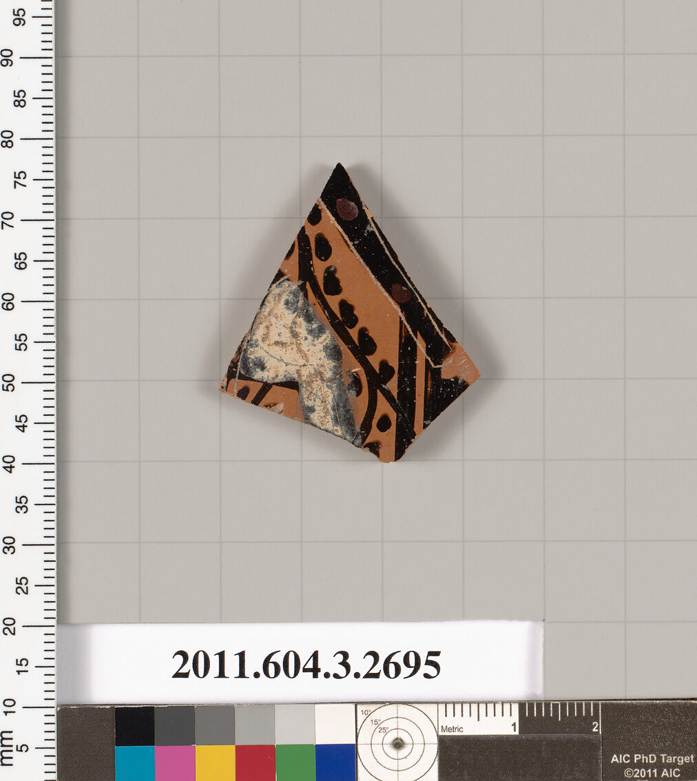 Terracotta fragment of an oinochoe (jug) or olpe (jug), Terracotta, Greek, Attic 