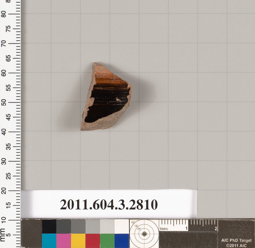 Terracotta fragment of an oinochoe (jug) or olpe (jug), Terracotta, Greek, Attic