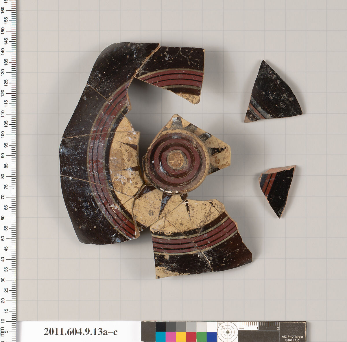 Terracotta fragments of a stemless cup (drinking cup) or a lid, Terracotta, Greek, Laconian?