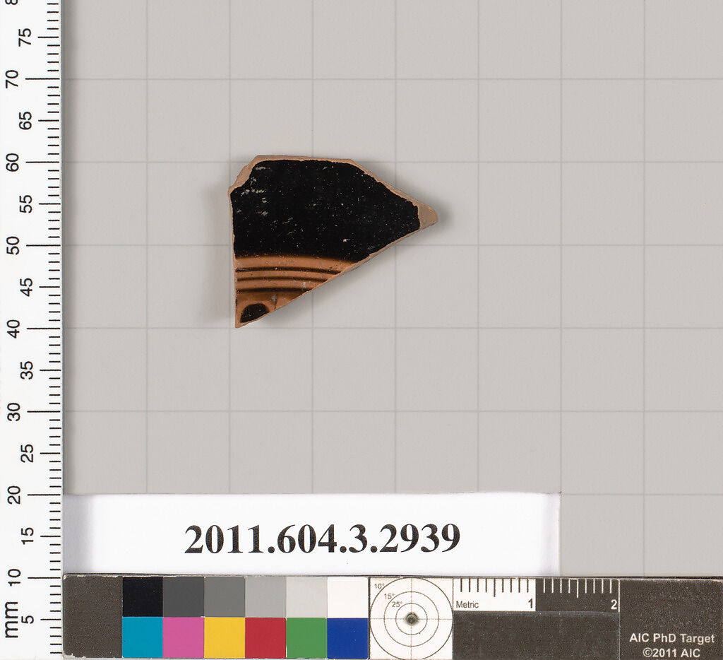 Terracotta fragment of a kylix (drinking cup), Terracotta, Greek, Attic 