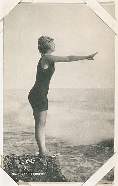 Bathing beauty posed to dive off rock from Mack Sennett Comedies Arcade series (W423), Commercial photolithograph 