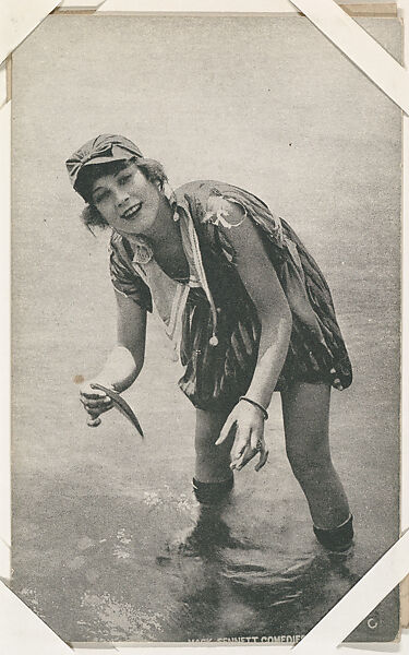 Bathing beauty holding fish from Mack Sennett Comedies Arcade series (W423), Commercial photolithograph 