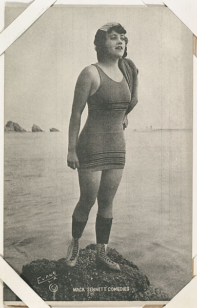 Bathing beauty standing on rock from Mack Sennett Comedies Arcade series (W423), Commercial photolithograph 