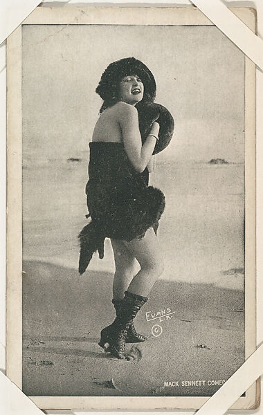 Bathing beauty in costume with fur muff from Mack Sennett Comedies Arcade series (W423), Commercial photolithograph 