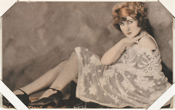 Actress in interior wearing lace dress (W423), Exhibit Supply Company, Commercial photolithograph 