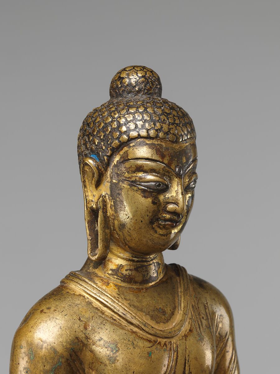 Enthroned Buddha Granting Boons, Gilt brass with silver and copper inlay, Pakistan (Gilgit Kingdom)