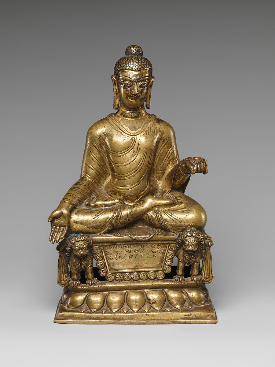 Enthroned Buddha Granting Boons, Gilt brass with silver and copper inlay, Pakistan (Gilgit Kingdom) 