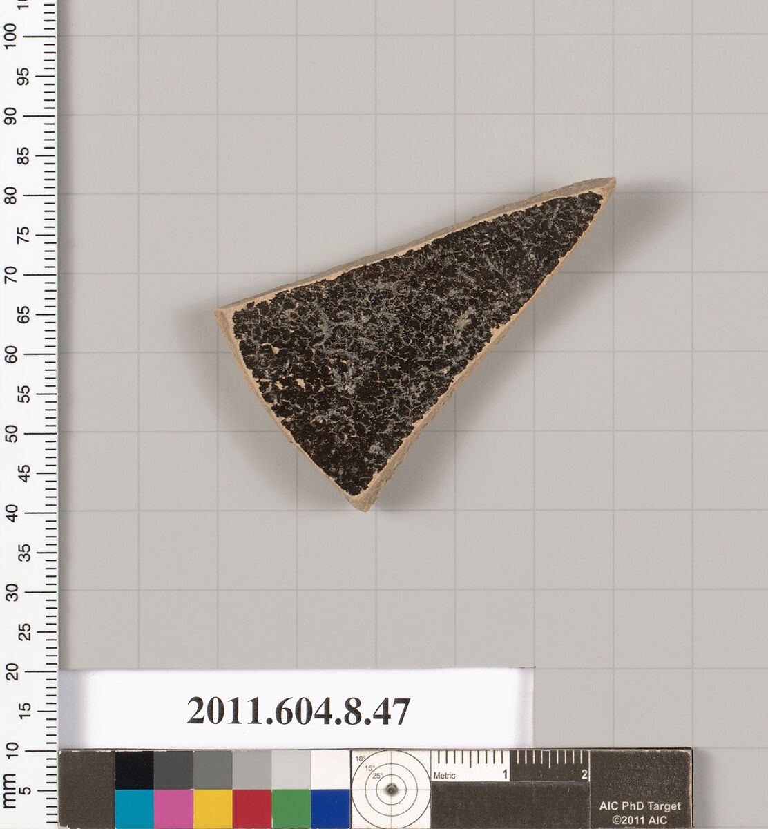 Terracotta fragment of a kylix: eye cup (drinking cup), Terracotta, Greek, Corinthian?