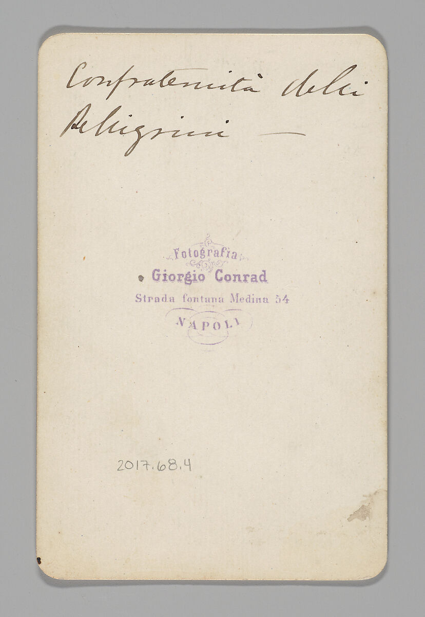 [Studio Portrait: Person Wearing White Robe and Face Covering Hood, Naples], Giorgio Conrad (Italian (born Switzerland), 1827–1889), Albumen silver print with applied color