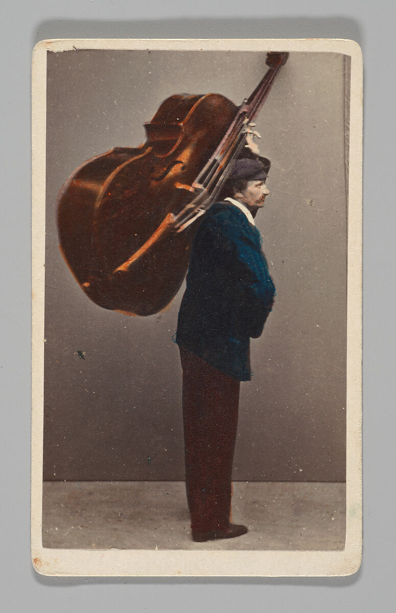 [Studio Portrait: Man Carrying Cello or Large Stringed Instrument, Venice], Carlo Ponti (Italian, Milan 1820–1893 Venice), Albumen silver print with applied color 