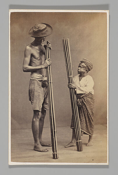 [Studio Portrait: Two Men each Holding Bamboo, Singapore], John Thomson (British, Edinburgh, Scotland 1837–1921 London), Albumen silver print 
