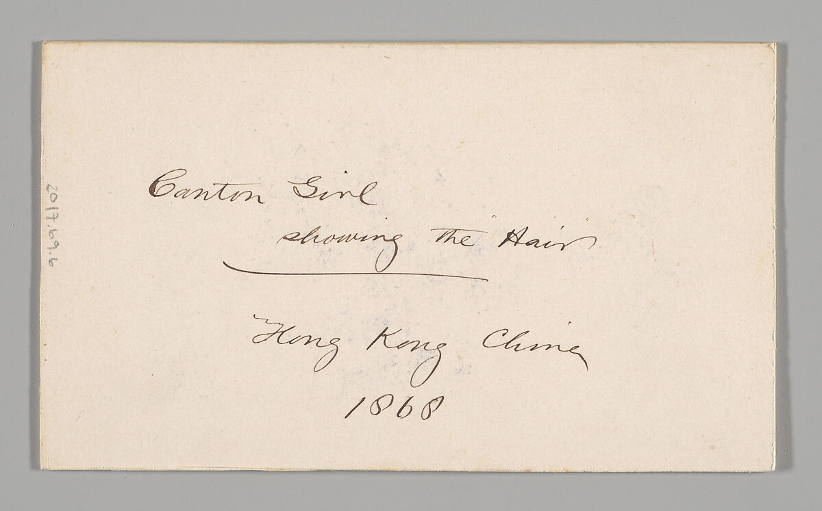 [Studio Portrait: Woman Standing in Profile Holding Umbrella, Hong Kong], Unknown, Albumen silver print with applied color