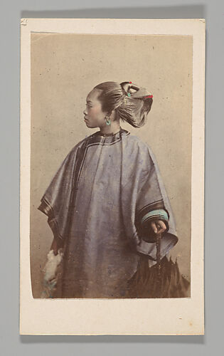 [Studio Portrait: Woman Standing in Profile Holding Umbrella, Hong Kong]