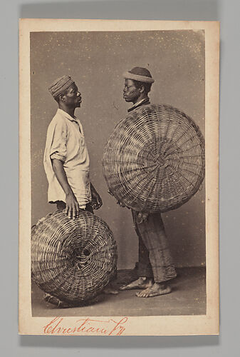 [Studio Portrait: Two Male Street Vendors in Profile with Baskets, Brazil]