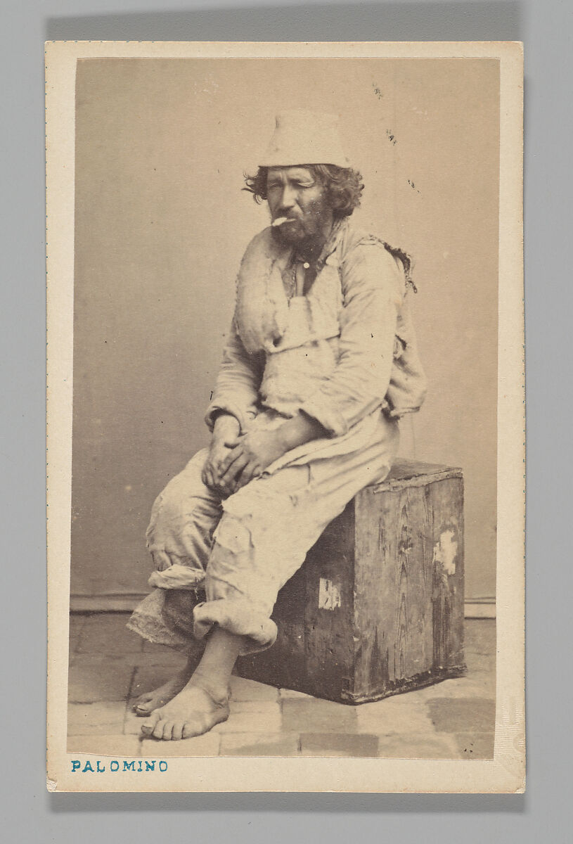 [Studio Portrait: Man Seated on Wooden Box ], Juan de la Cruz Palomino (Peruvian, active Chile, 1860s–1900s), Albumen silver print 