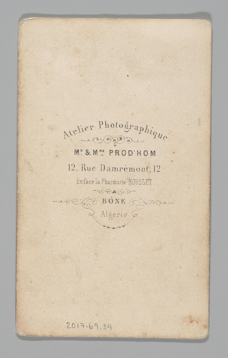 [Studio Portrait: Woman with Straw Basket, Algeria], Maison Prod'hom (Swiss, active Algeria, from 1862), Albumen silver print