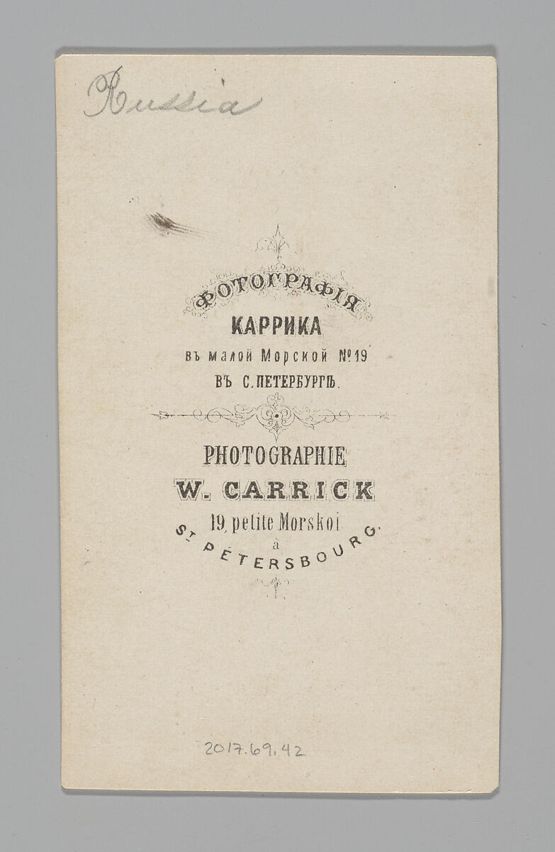 [Studio Portrait: Man in Coat Carrying Baskets, St. Petersburg], William Carrick (British, Edinburgh, Scotland 1827–1878 St. Petersburg, Russia), Albumen silver print