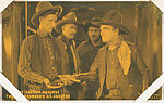 The Sheriff returns Two-Gun Desmond's six-shooter from Western Stars or Scenes Exhibit Cards series (W412), Exhibit Supply Company  American, Commercial color photolithograph