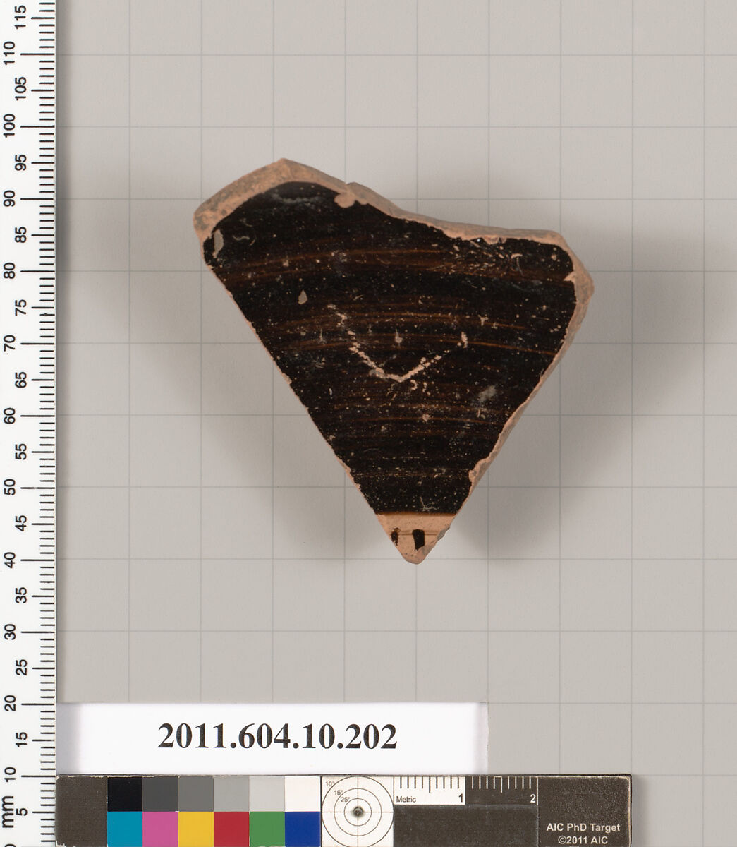 Terracotta fragment from a kylix (drinking cup), Terracotta, Etruscan