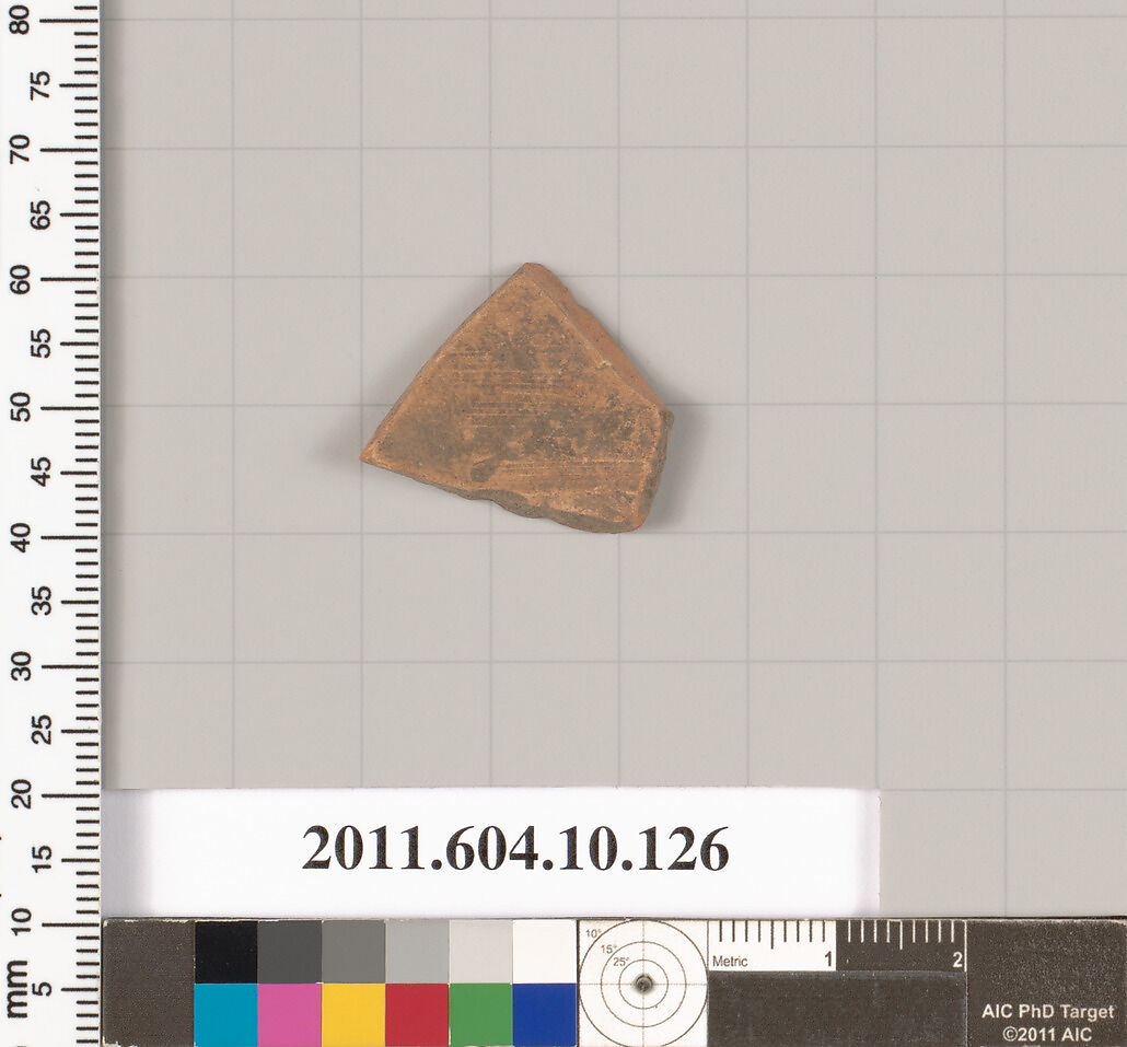 Terracotta fragment of a closed shape, Terracotta, Etruscan