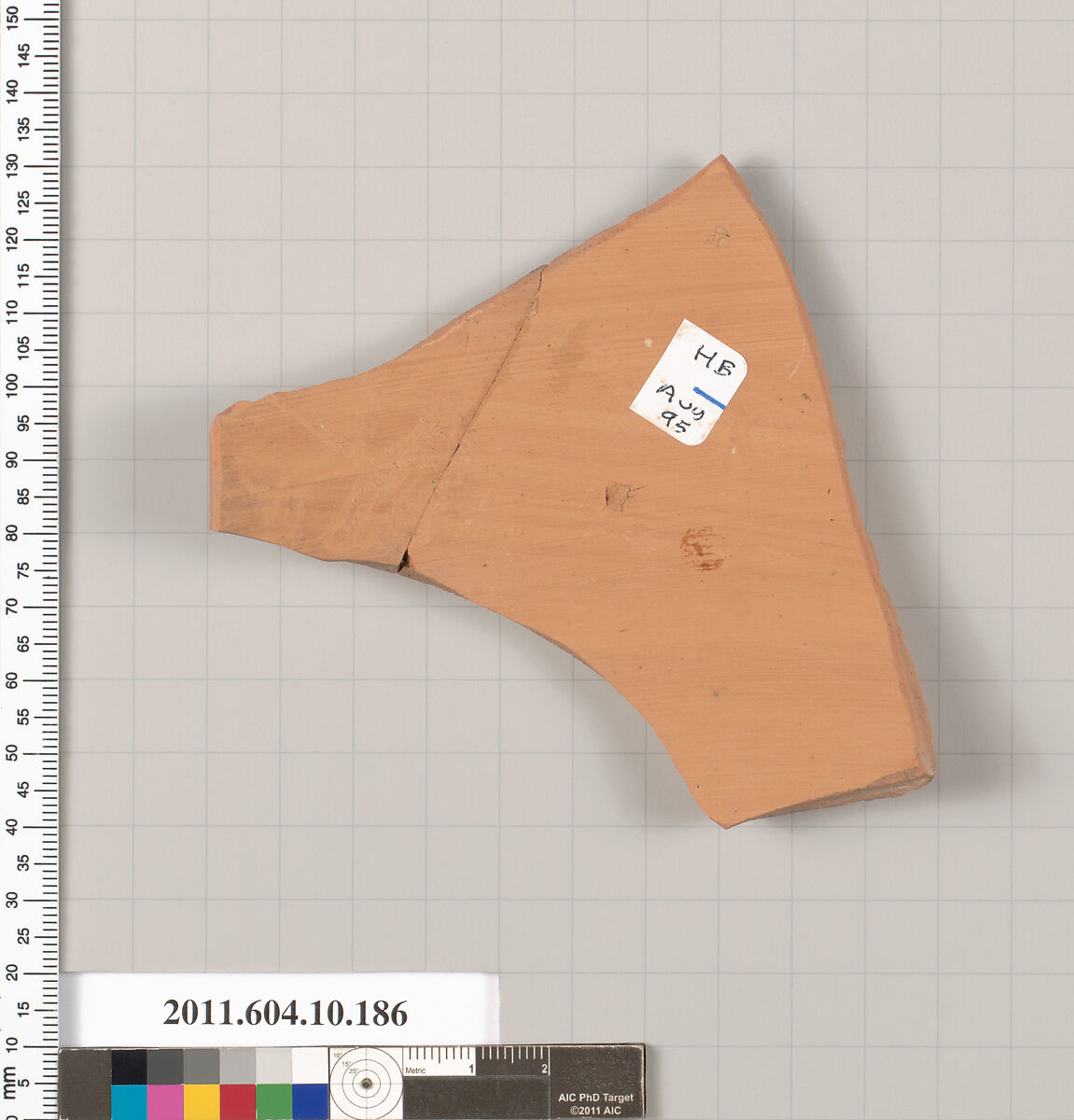 Terracotta fragment of a closed shape, Terracotta, Etruscan