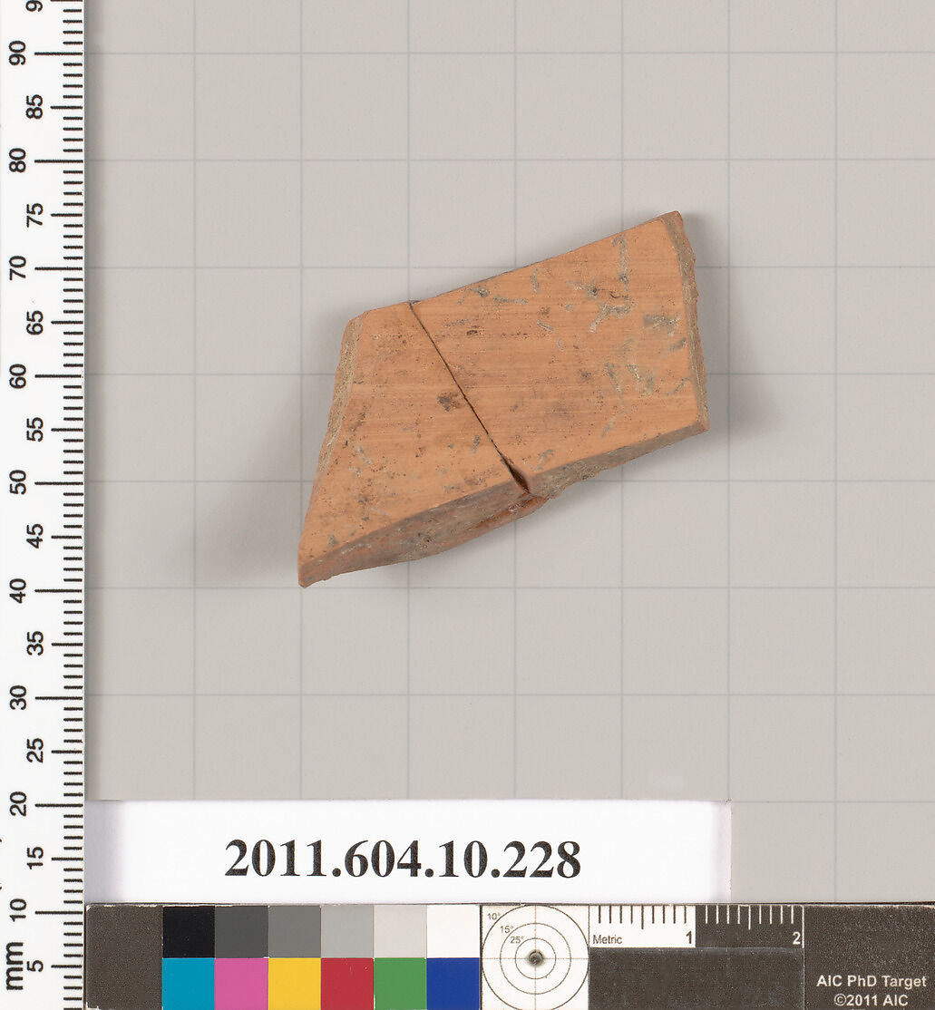 Terracotta fragment of a closed shape, Terracotta, Etruscan