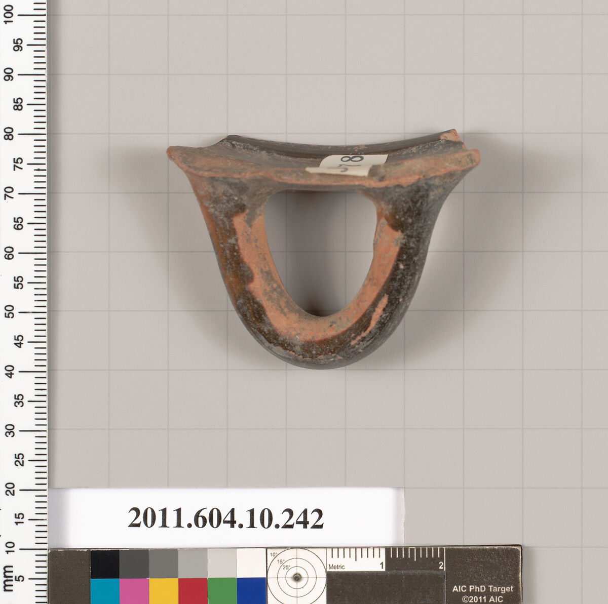 Terracotta fragment of a skyphos (deep drinking cup), Terracotta, Etruscan