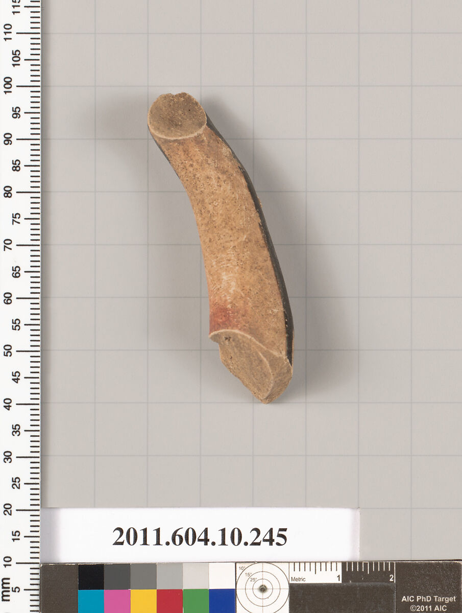 Terracotta fragment of a kylix (drinking cup)?, Terracotta, Etruscan