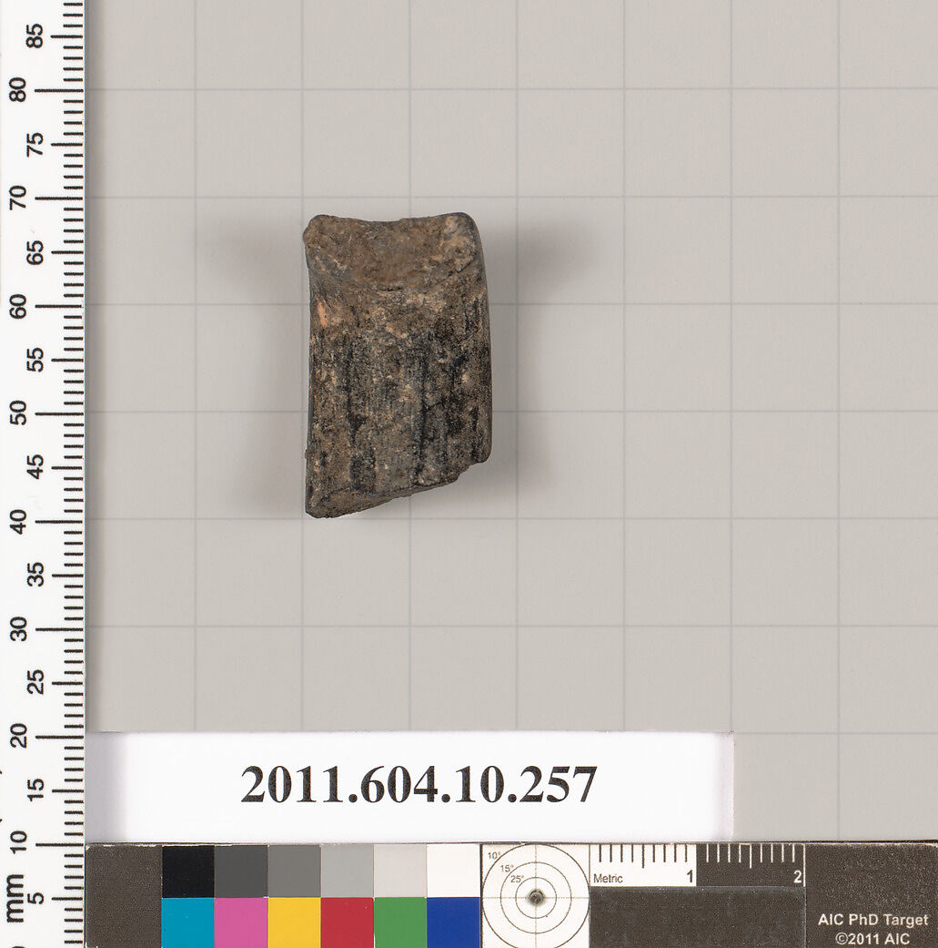 Terracotta fragment of a handle, Terracotta, Etruscan