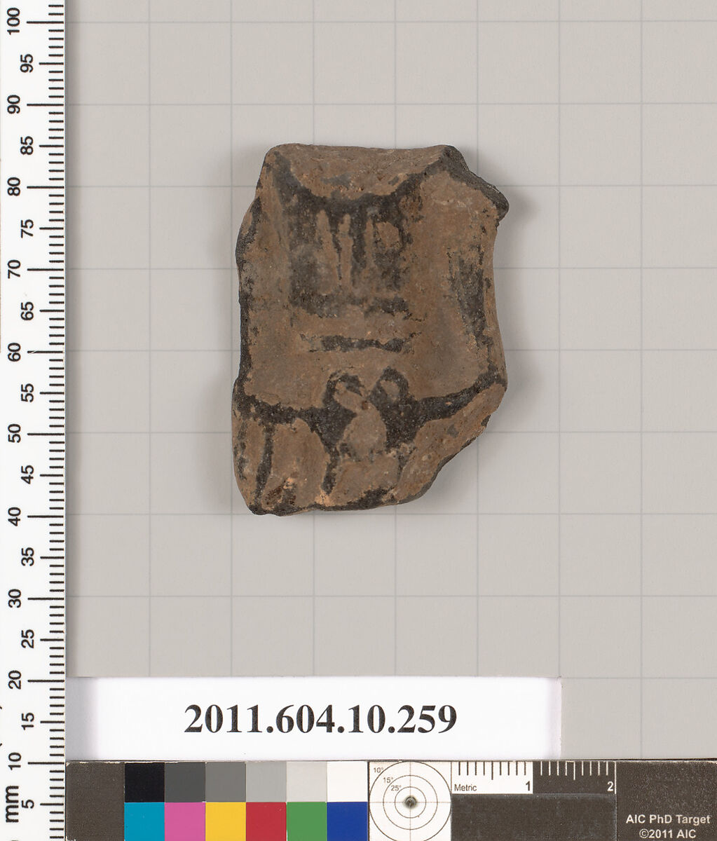 Terracotta fragment of a handle, Terracotta, Etruscan 