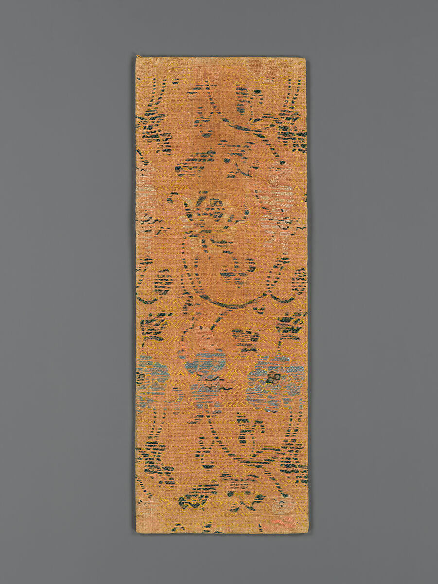 Sutra cover with boys holding the stems of large flowers, Plain-weave silk with supplementary weft patterning, China 