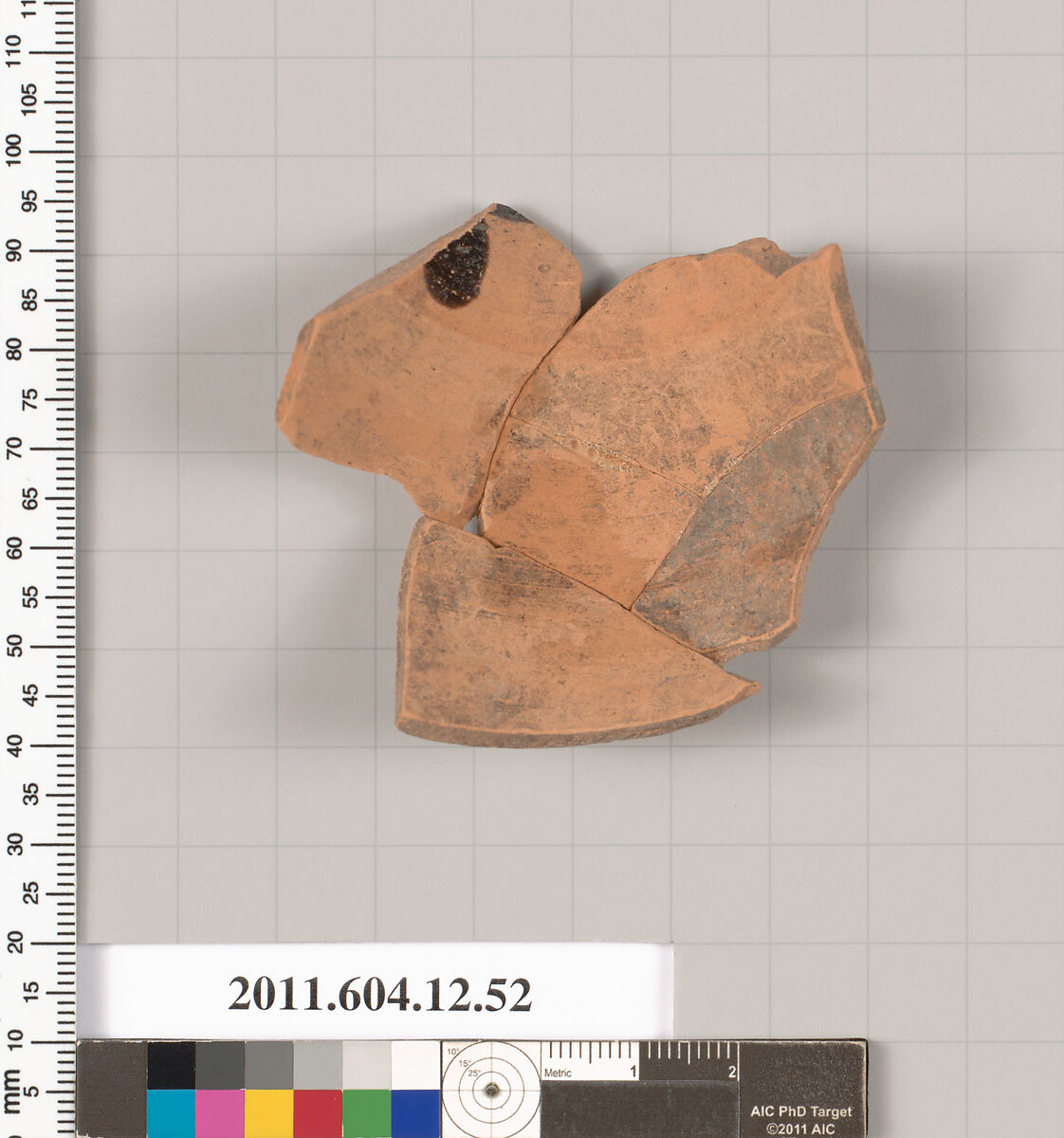Terracotta fragment of a chous (jug), Terracotta, Greek, South Italian