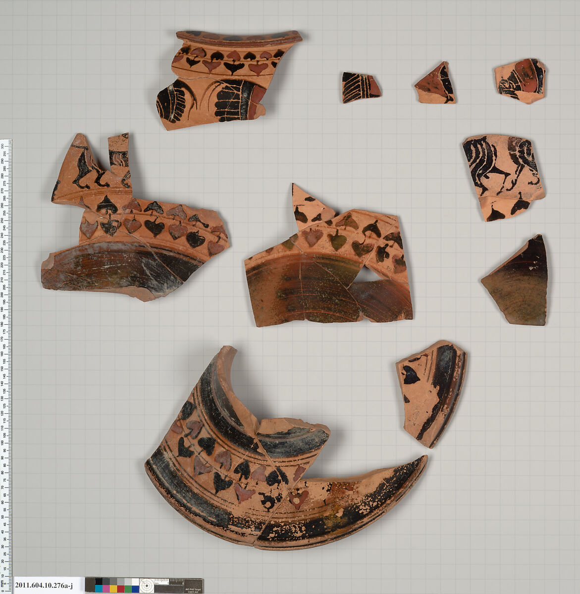 Terracotta fragments of a dinos (bowl for mixing wine and water), Terracotta, Etruscan 