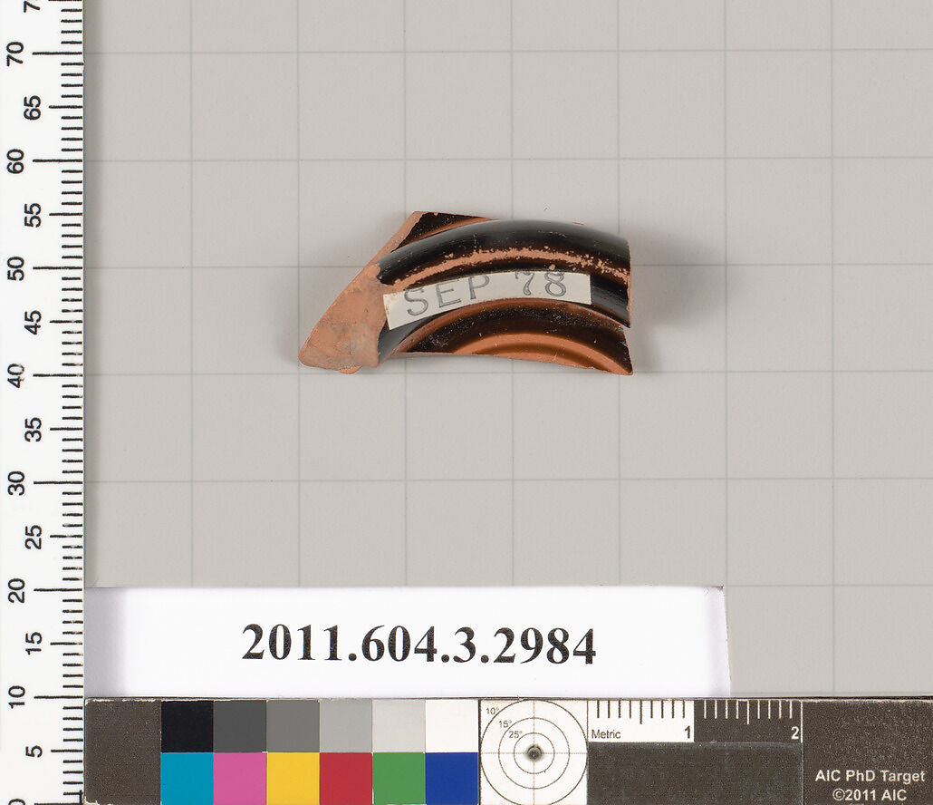 Terracotta fragment of a stemless kylix (drinking cup), Terracotta, Greek, Attic
