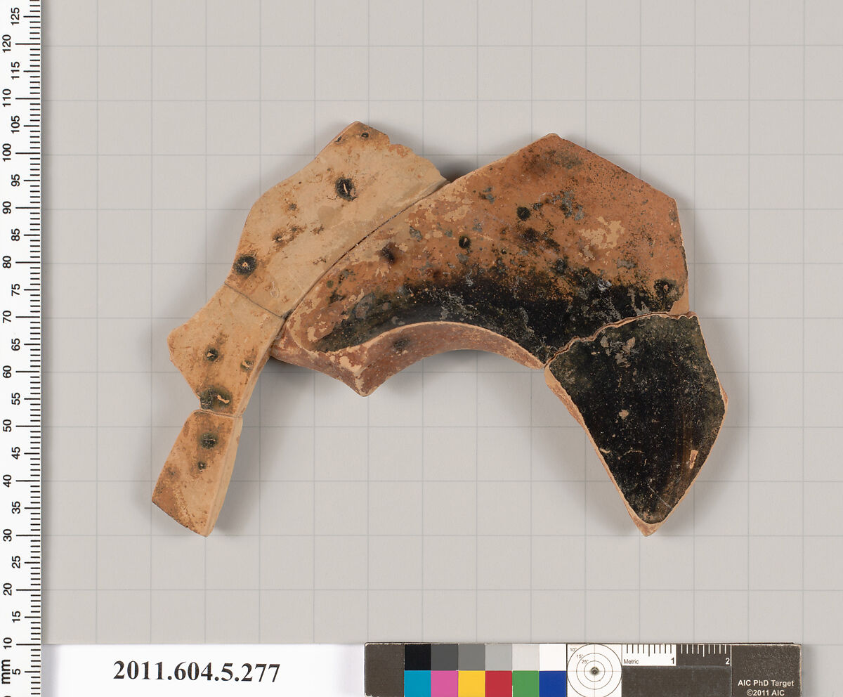 Terracotta fragment of a kylix (drinking cup), Terracotta, Greek, Attic