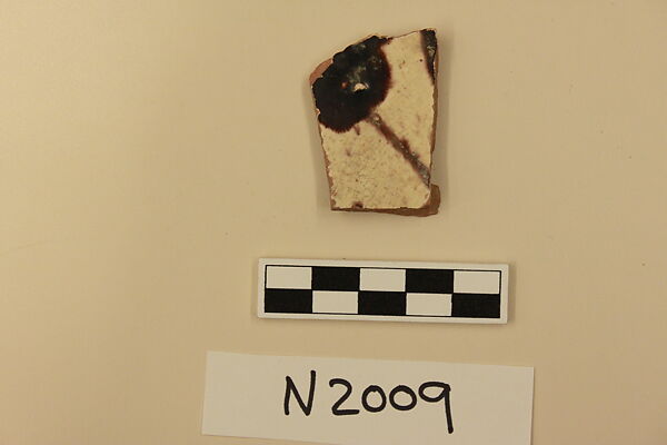 Ceramic Fragment, Earthenware; white slipped, slip-painted under a colorless glaze 