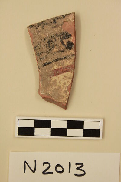 Ceramic Fragment, Earthenware; white slipped, slip-painted under a colorless glaze 